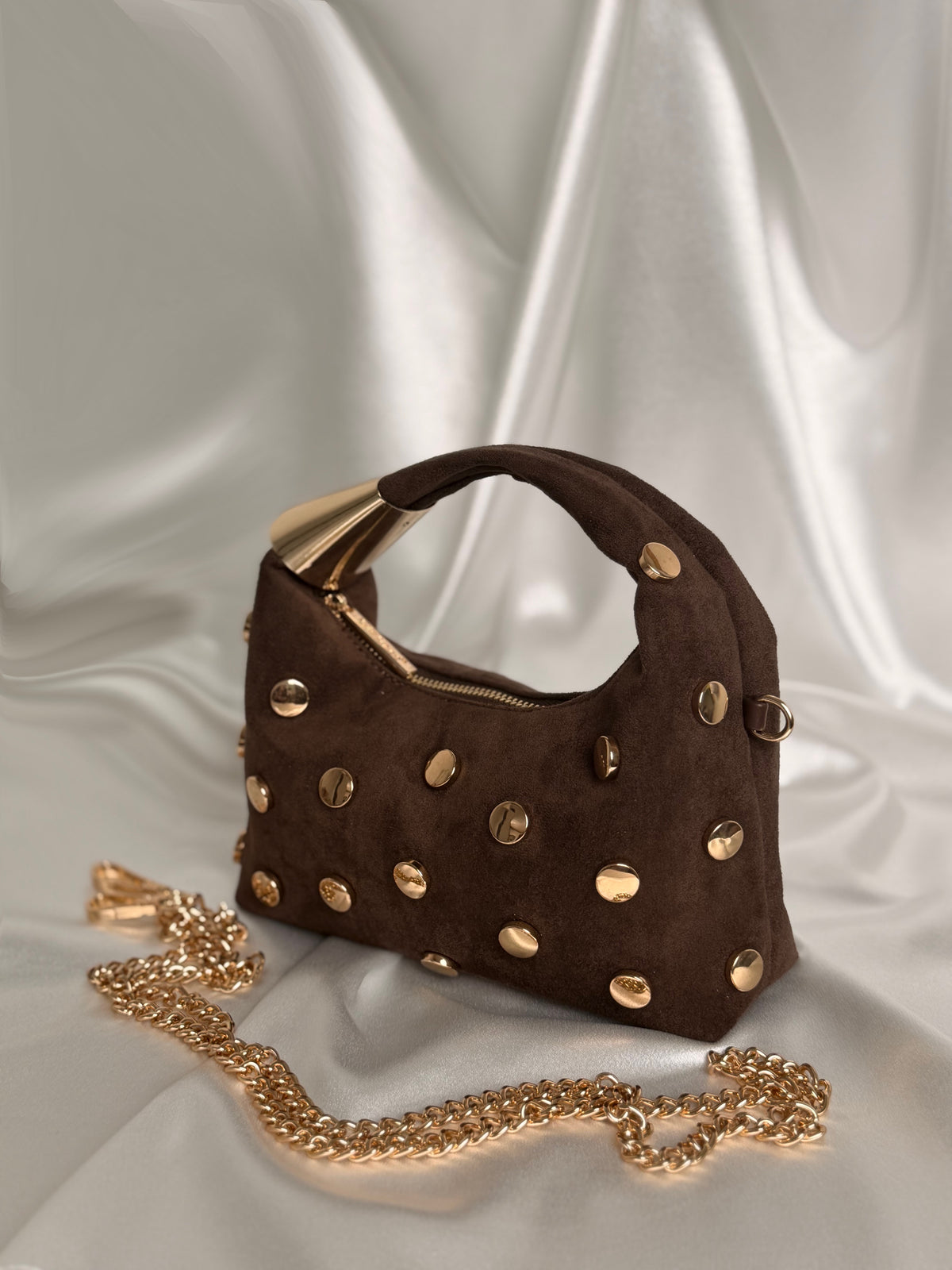 Sac à clous doré
