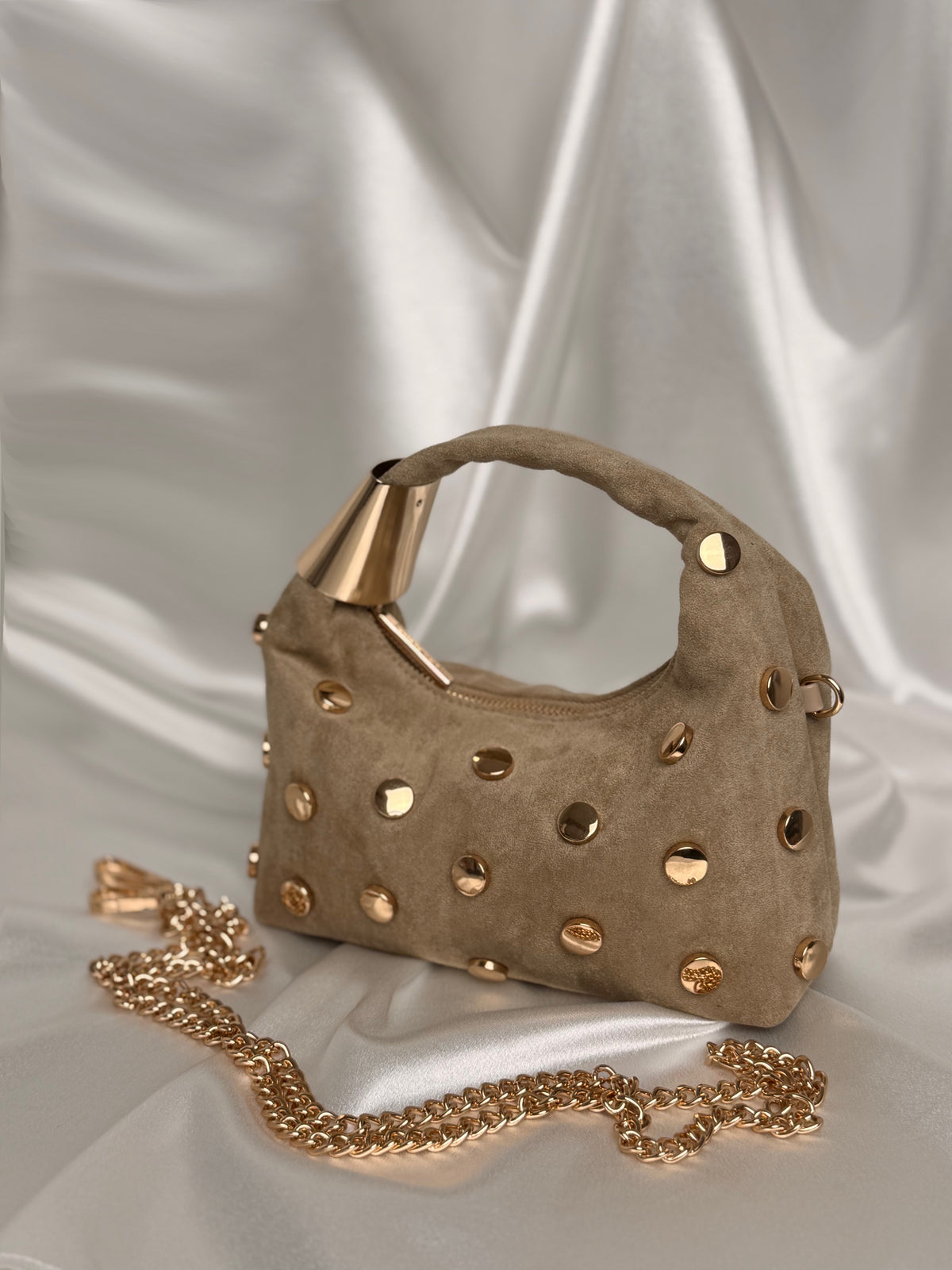 Sac à clous doré