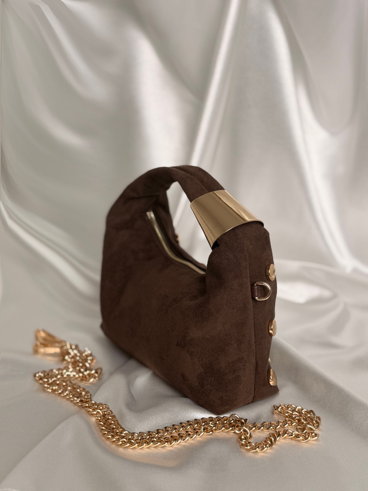 Sac à clous doré