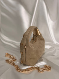 Sac à clous doré