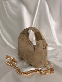 Sac à clous doré